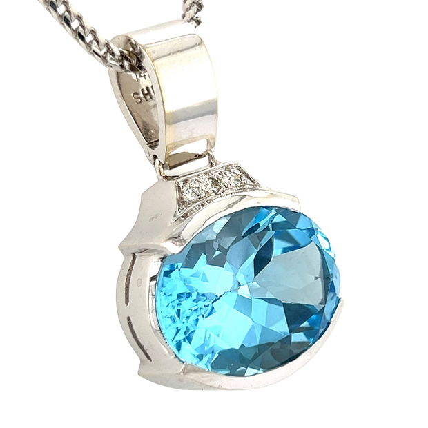 14k White Gold and Blue Topaz Pendant